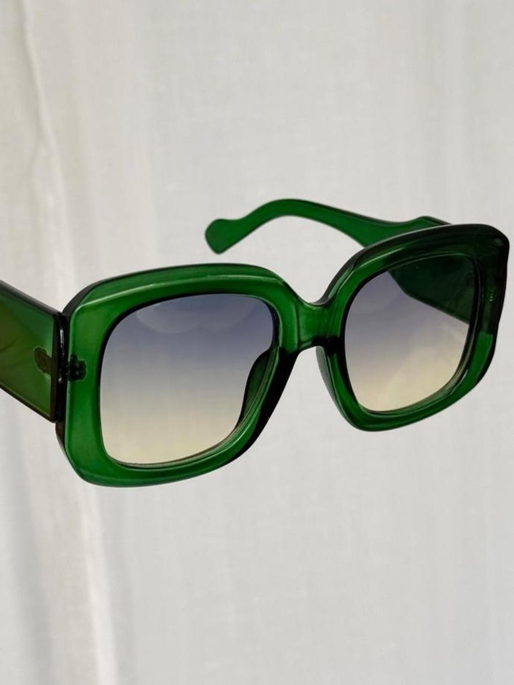 oversized green 70s inspired sunglasses โฆ